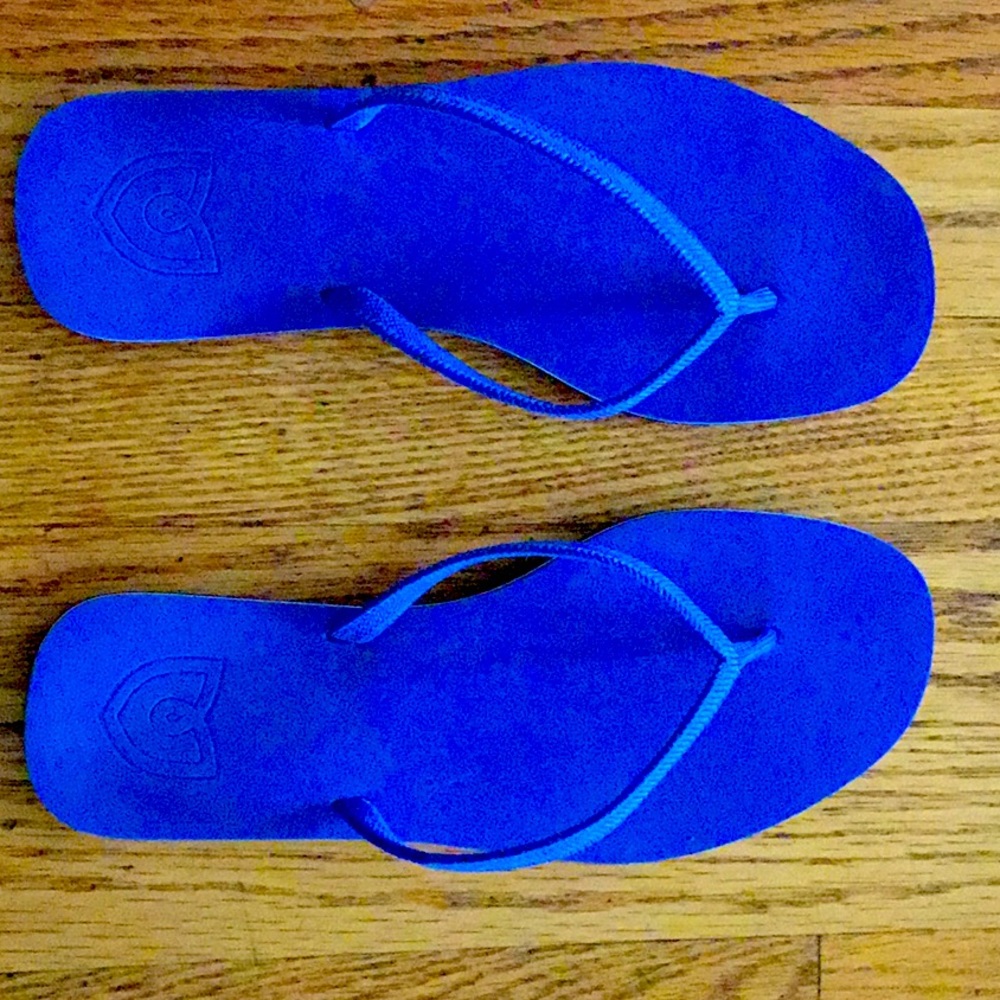 Rothy’s Flip Flop, size 6. Never worn.